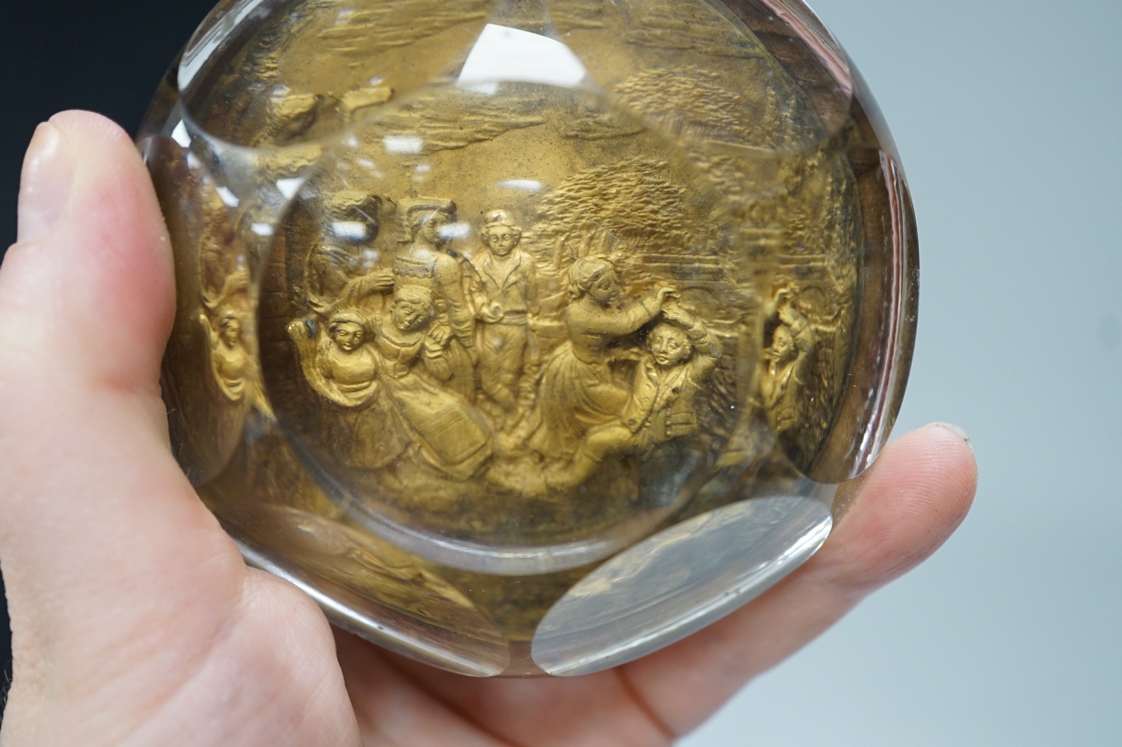 Temple Bar commemorative cast lead and brass paperweight, ‘Temple Bar: erected 1672, demolished 1878; this effigy of it was struck from the lead formally on the roof’ and a 19th century gilt metal relief glass cased pape